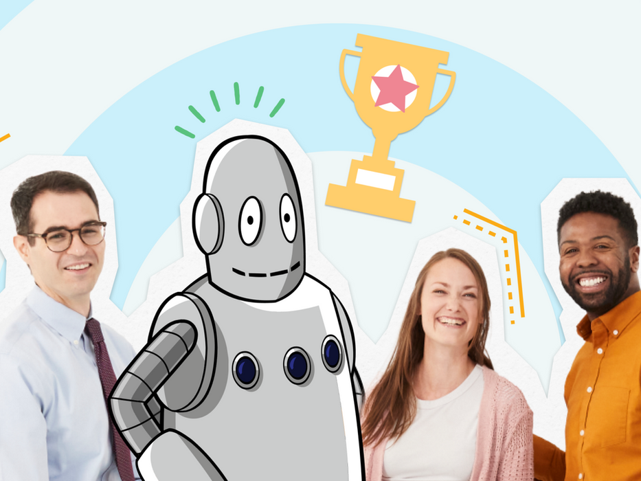 Moby the robot smiles with a trophy next to a group of teachers.