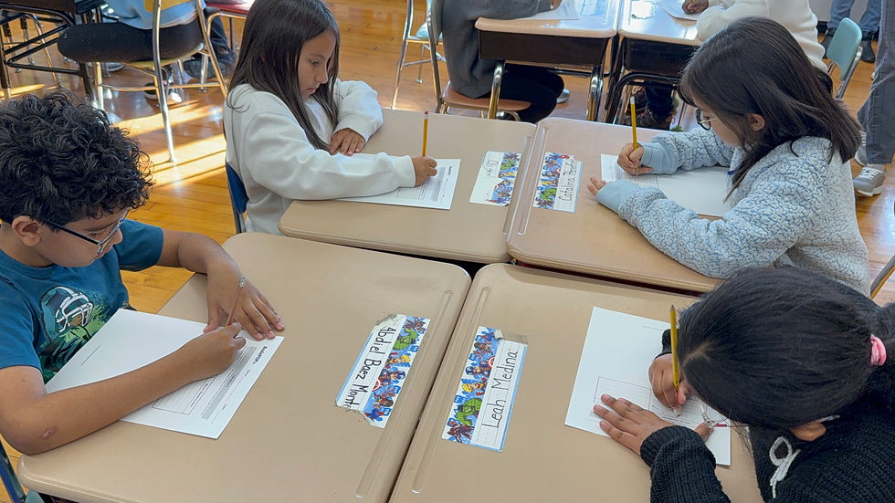 Students in Bloomfield classroom filling out worksheets after watching a BrainPOP Jr. movie