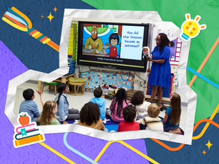 A teacher stands beside a screen showing a BrainPOP Jr. movie with Moby and Annie asking how Mae Jemison became an astronaut, while a group of young students sit on the floor watching, surrounded by icons of a lightbulb, paintbrush, and a stack of books topped with an apple.
