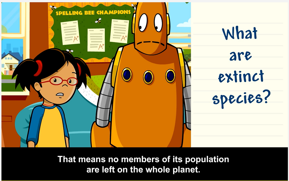 Annie and Moby stand side by side in a classroom for young learners. Text: What are extinct species? Subtitles: That means no members of its population are left on the whole planet. From the BrainPOP Jr. Extinct and Endangered Species movie.