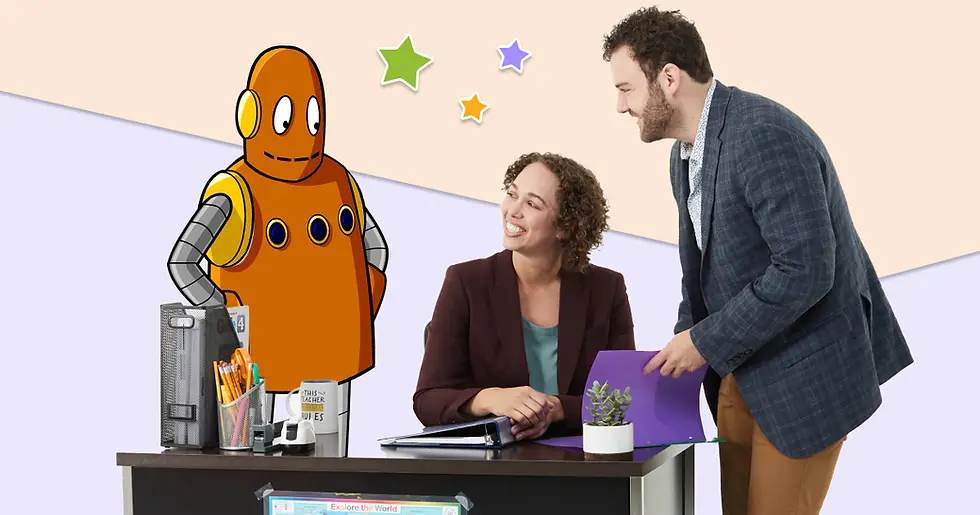Moby the orange robot, woman, and man interact cheerfully at an office desk. Star decor on pastel walls; desk items include a mug saying "This teacher rules."