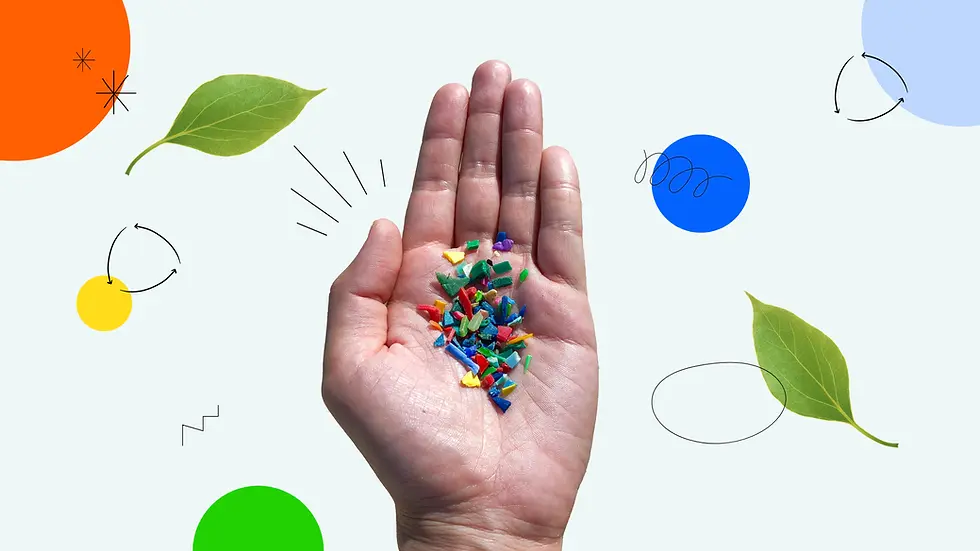 Hand holding colorful plastic fragments. Background features green leaves, abstract shapes, and lines on a light backdrop.